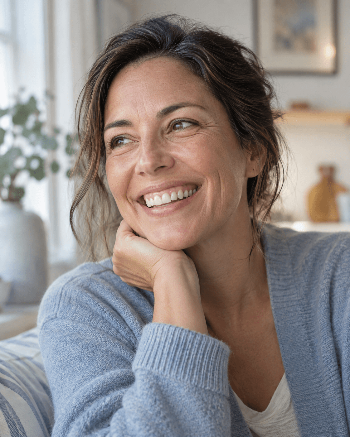 Illustrative portrait of an adult smiling in a relaxed home setting